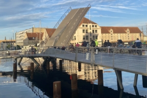 A draw bridge opening over water