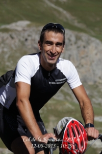 Man riding a touring bicycle