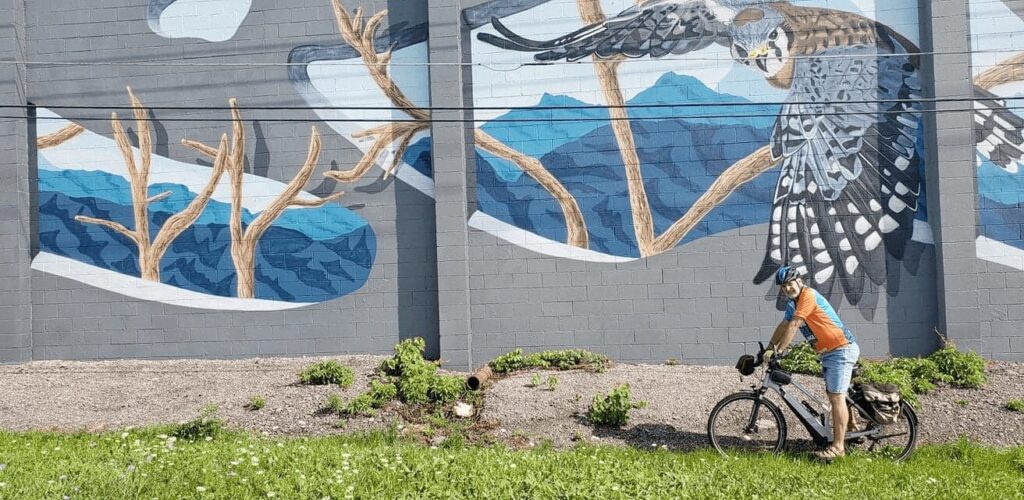 Biker photo infron of a wall