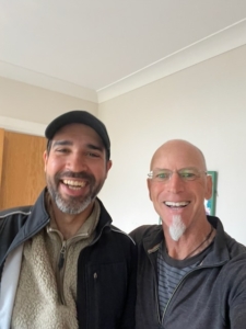2 men smiling