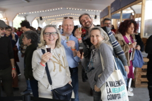 A group of people drinking wine together